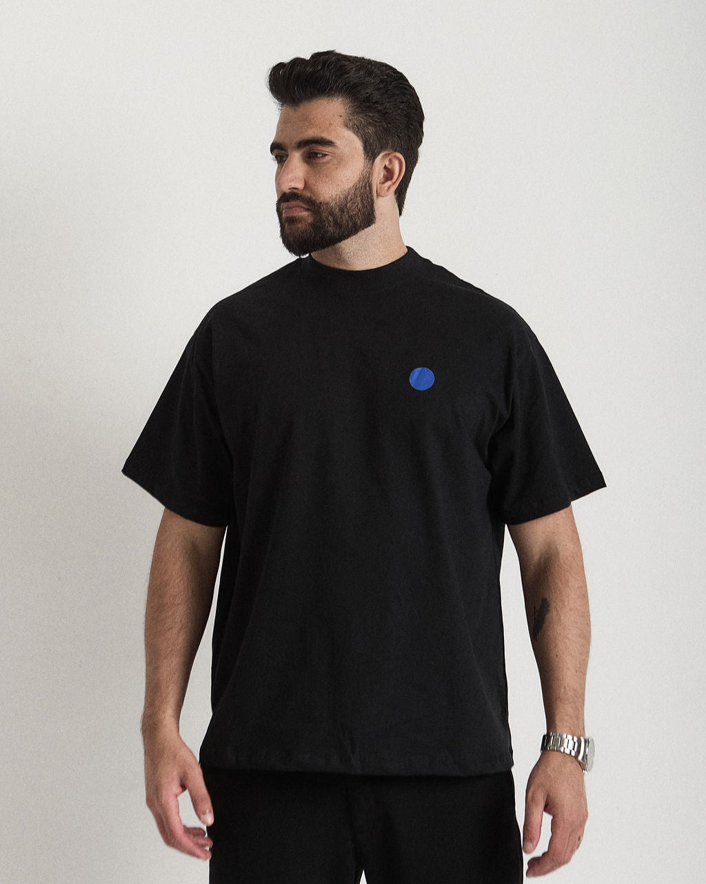 Oversized Corclaw com estampa tipográfica.